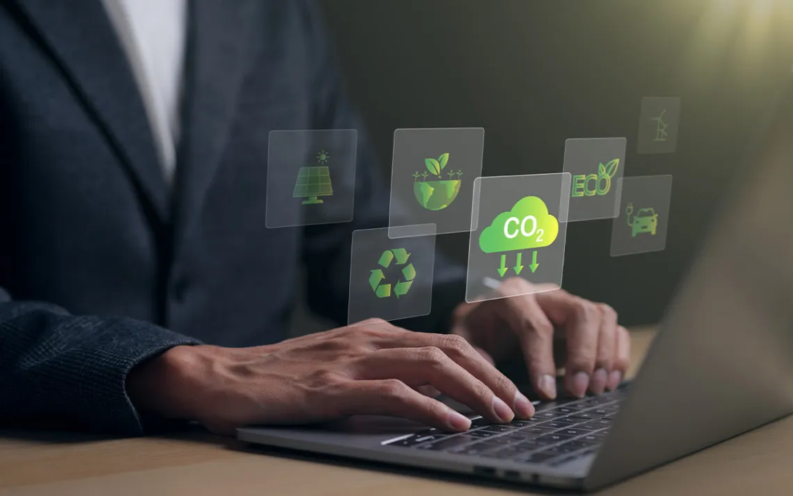 Reduce CO2 emission concept. Businessman using laptop for working technology Net zero and Carbon neutrality, green business and development based on renewable energy. 