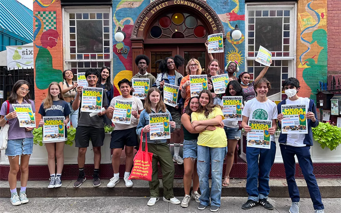 Climate activists pose outside the Sixth Street Community Center in New York.