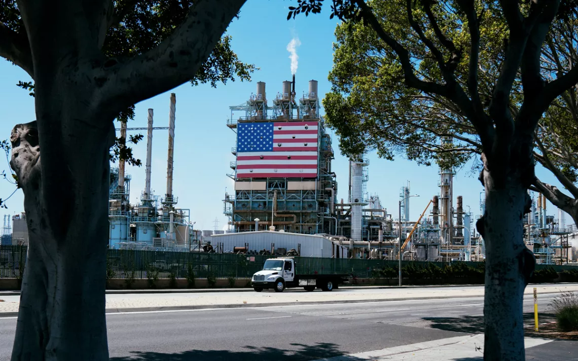 A US flag hangs on the side of the Marathon refinery.