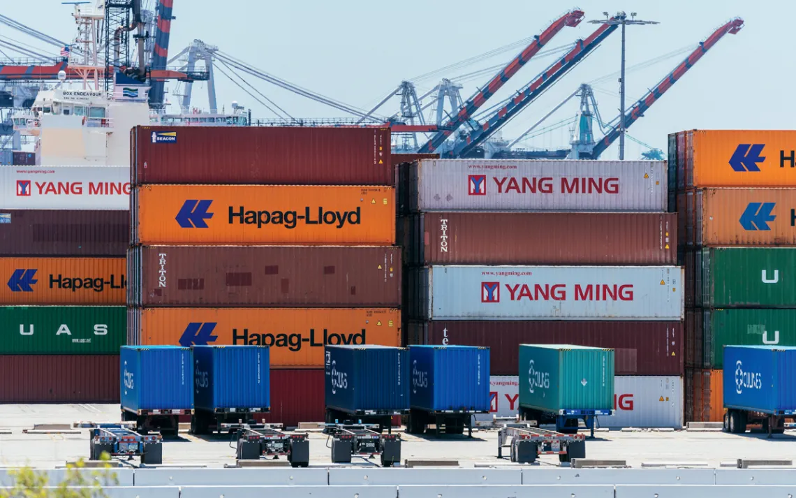 Close-up of shipping containers stacked at the port.