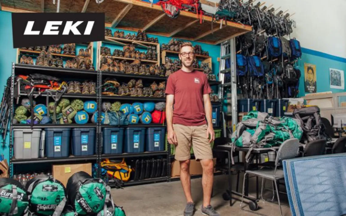 Andrew Pringle of the Washington Trails Association poses in a Seattle gear library space that the organization recently outgrew, due to demand. 