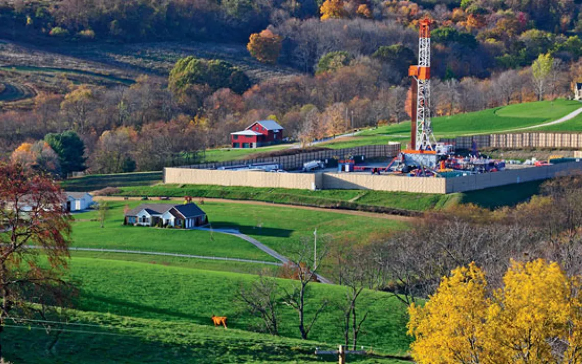A natural gas rig side by side with homes in Washington County, Pennsylvania.