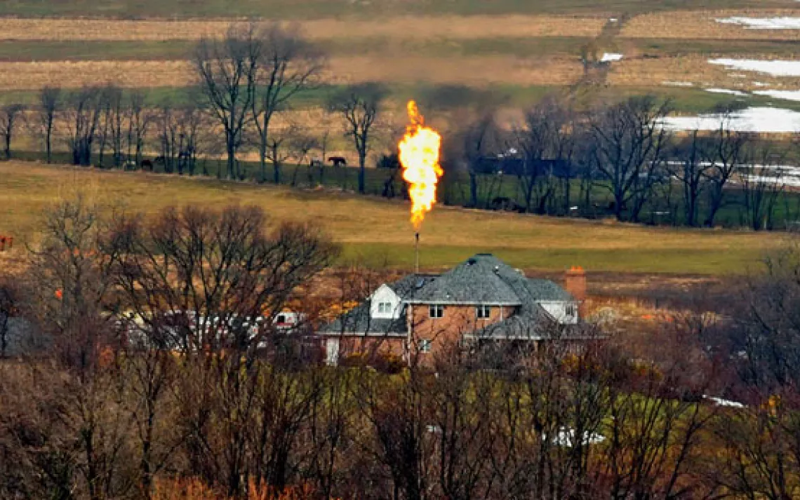 Flames shoot from a natural gas well in Mount Pleasant Township, Washington County.