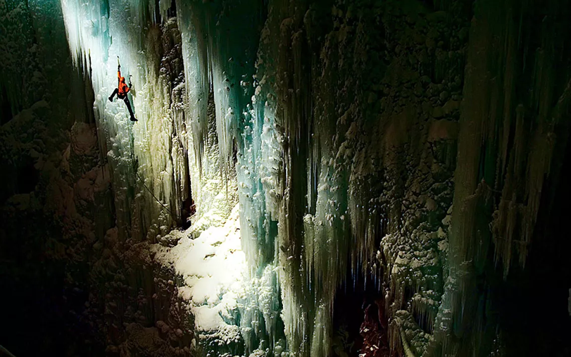 climber in an ice cave