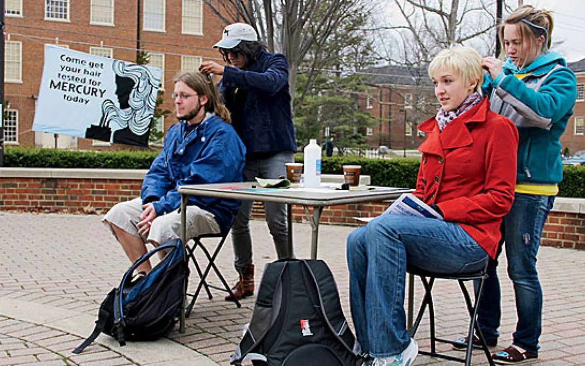 Student activists at Miami University collect hair samples for testing