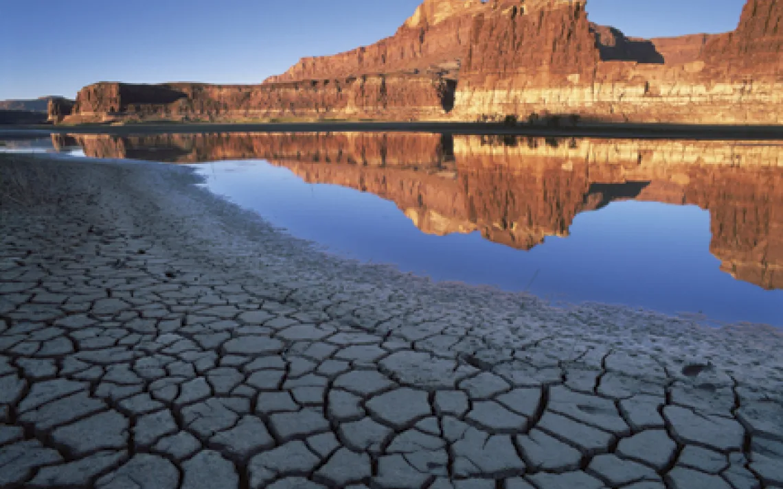 Morning light illuminates cliffs across from Lake Powell’s abandoned Hite Marina boat ramp. 
