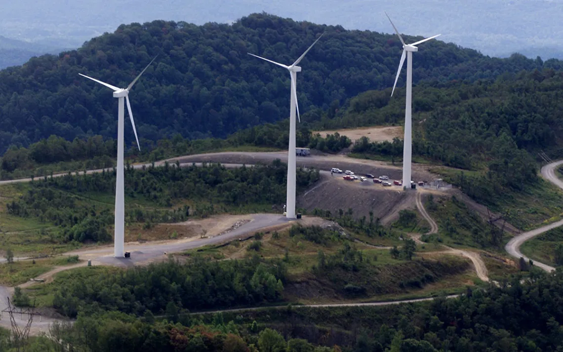 Three windmill turbines sit atop Buffalo Mountain in Oliver Springs, Tenn