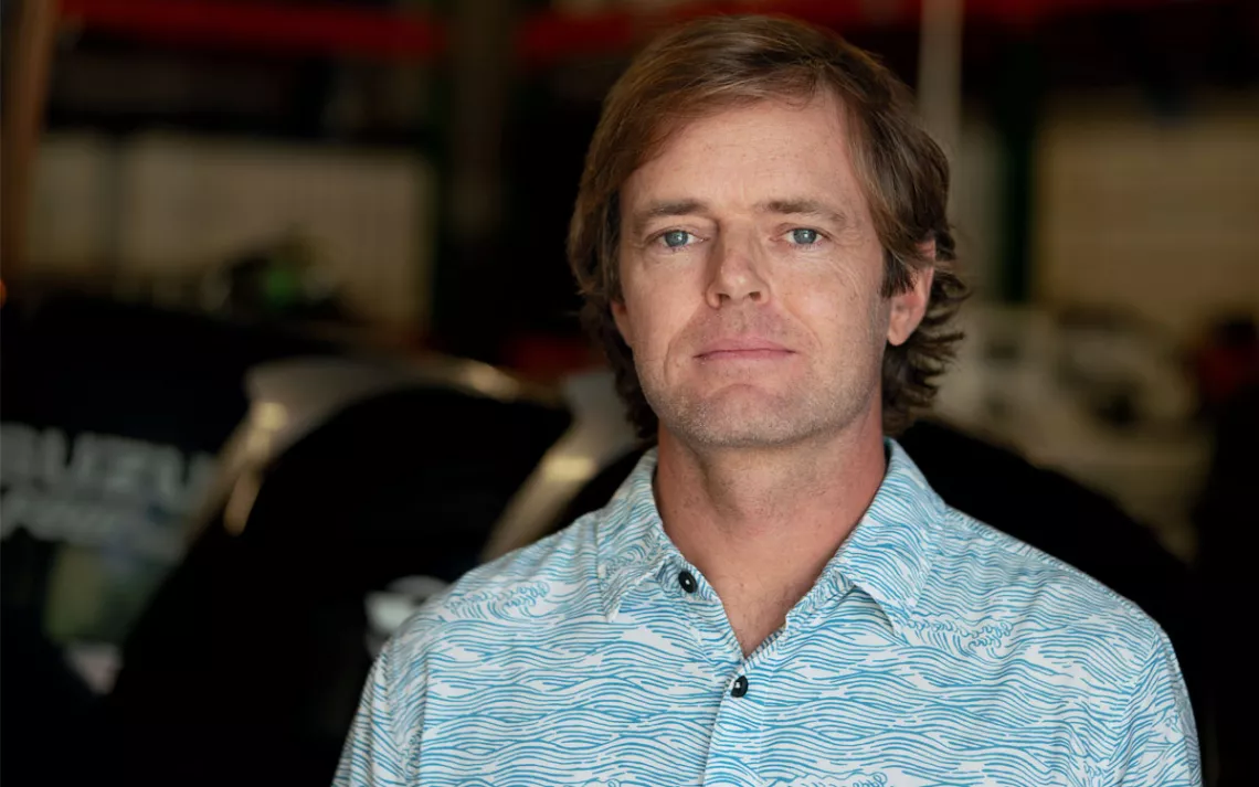 Portrait of Kevin O'Brien wearing a light-blue button-up shirt and looking at the camera.