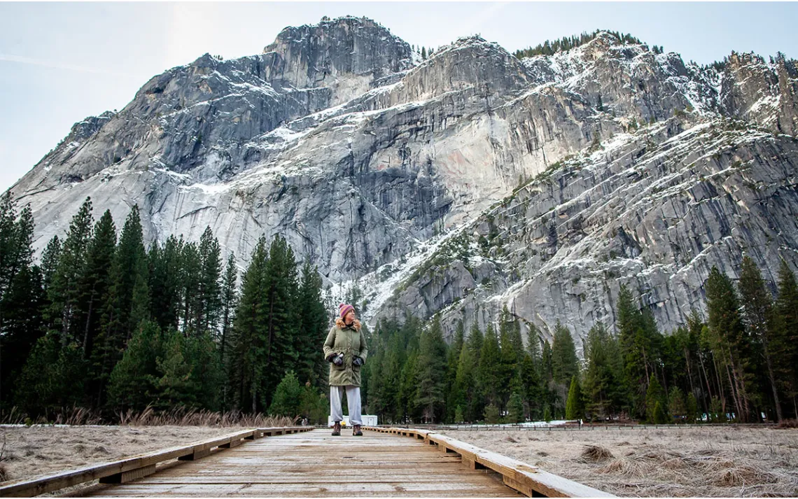 With Glacier Point in the background, writer Carmen Kohlruss takes in views of high cliffs and peaks rising from Yosemite Valley on a chilly Sunday morning.