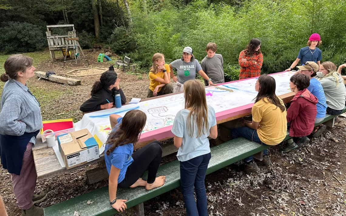 With the public schools shuttered after Hurricane Helene, teachers launched a makeshift outdoor school in Celo for any kids who could get there.