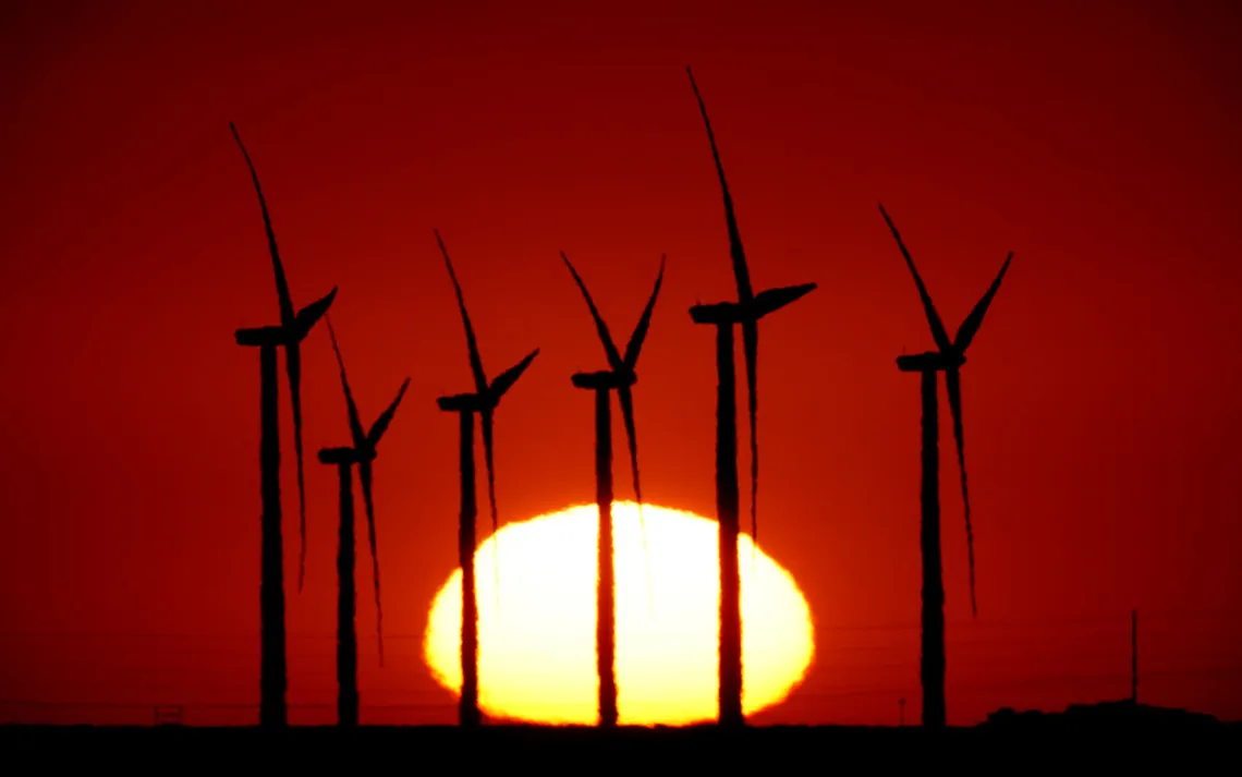 Windmills in front of a setting sun