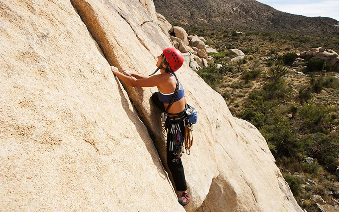 Female Rock Climber Joshua Tree National Park, California.
