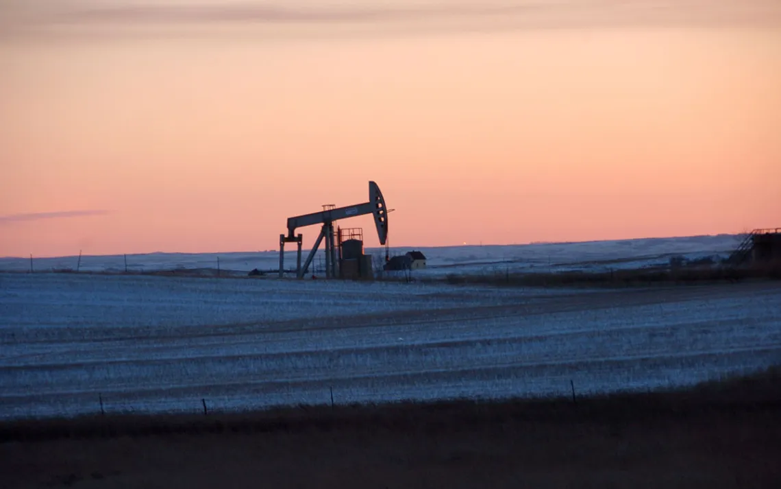 In this Feb. 25, 2015 photo, a pump jack for pulling oil from the ground is seen near New Town, N.D. 