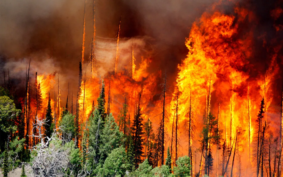 A wildfire menacing a southern Utah ski town for nearly a week flared again, doubling in size for the second night in a row and torching more homes after residents fled the flames