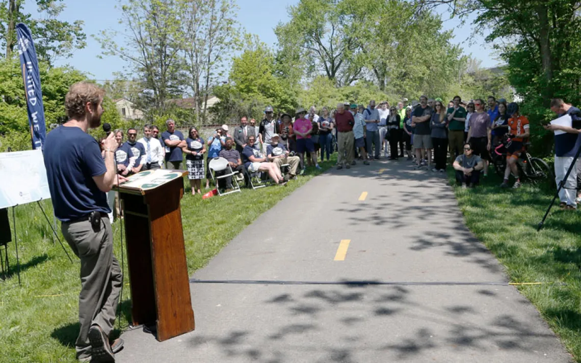 Eric Oberg, director of trail development for Rails-to-Trails Conservancy, addresses the crowd during a celebration announcing the preferred route of the Great American Rail-Trail Wednesday, May 8, 2019 in Columbus, Ohio. 