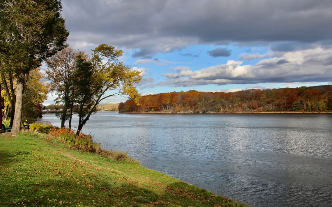 An autumnal view of 1011 2nd Ave Forest from across the river in Waterford, New York. 