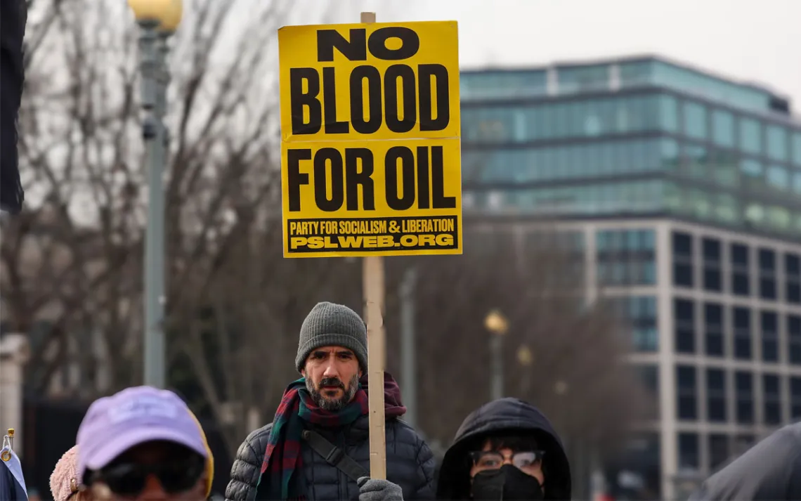 January 3, 2026, The White House, Washington, D.C. USA. Demonstrators gather to protest actions taken by former President Donald Trump related to Venezuela, holding signs and flags during a public rally. Protesters voiced opposition to U.S. policies and statements concerning the Venezuelan government and its leadership. (Photo by Robyn Stevens Brody/Sipa USA)(Sipa via AP Images)