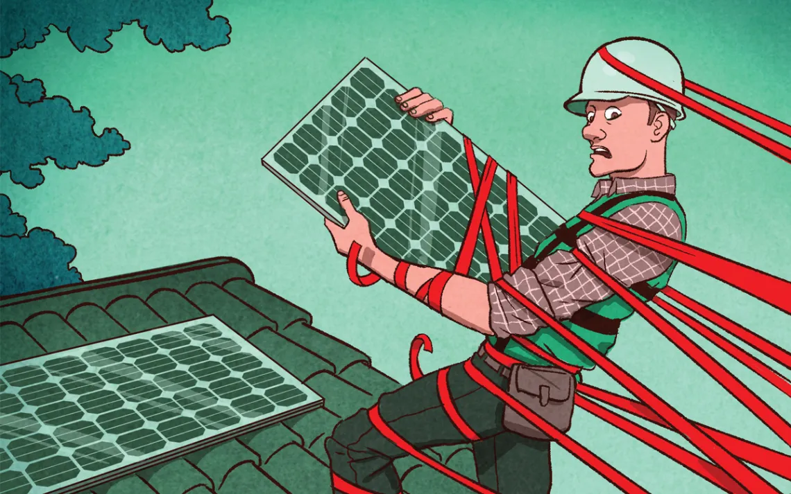 Illustration shows a worker on a rooftop installing solar panels with red tape wrapped around him, pulling him back.