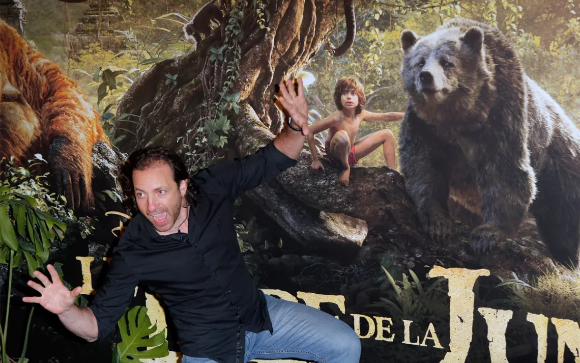 Former French Olympic skater Philippe Candeloro poses during a photo call prior to the screening of the French premiere of "The Jungle Book" in Paris, France. | Photo courtesy of AP Photo/Francois Mori