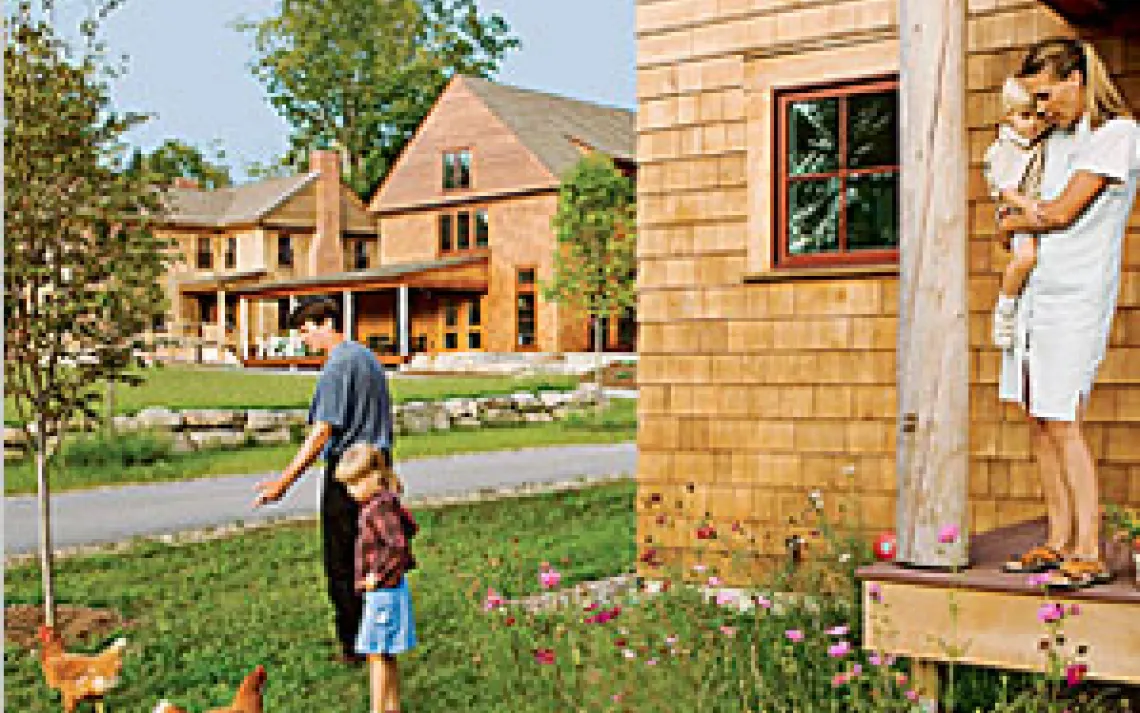 Noel White, Johanna Wilson-White, and their two children enjoy Nubanusit's car-free common areas
