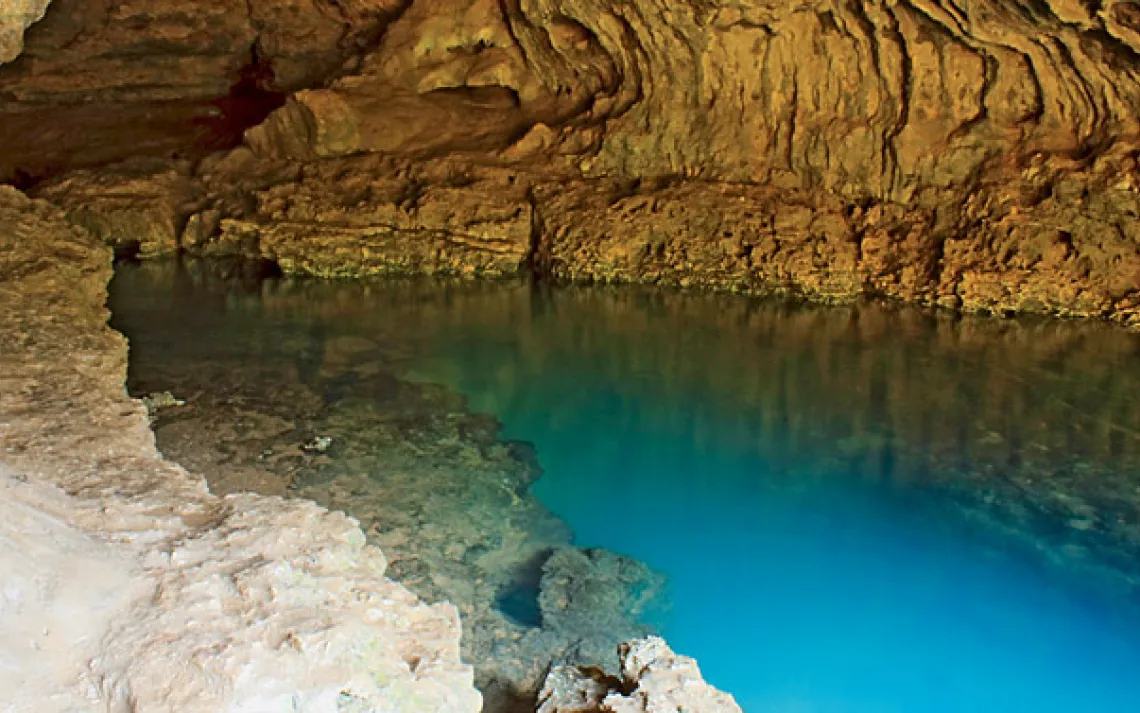 The 140-foot-deep Cave Spring is one of 65 subterranean water sources that keep the Current River navigable almost year-round.