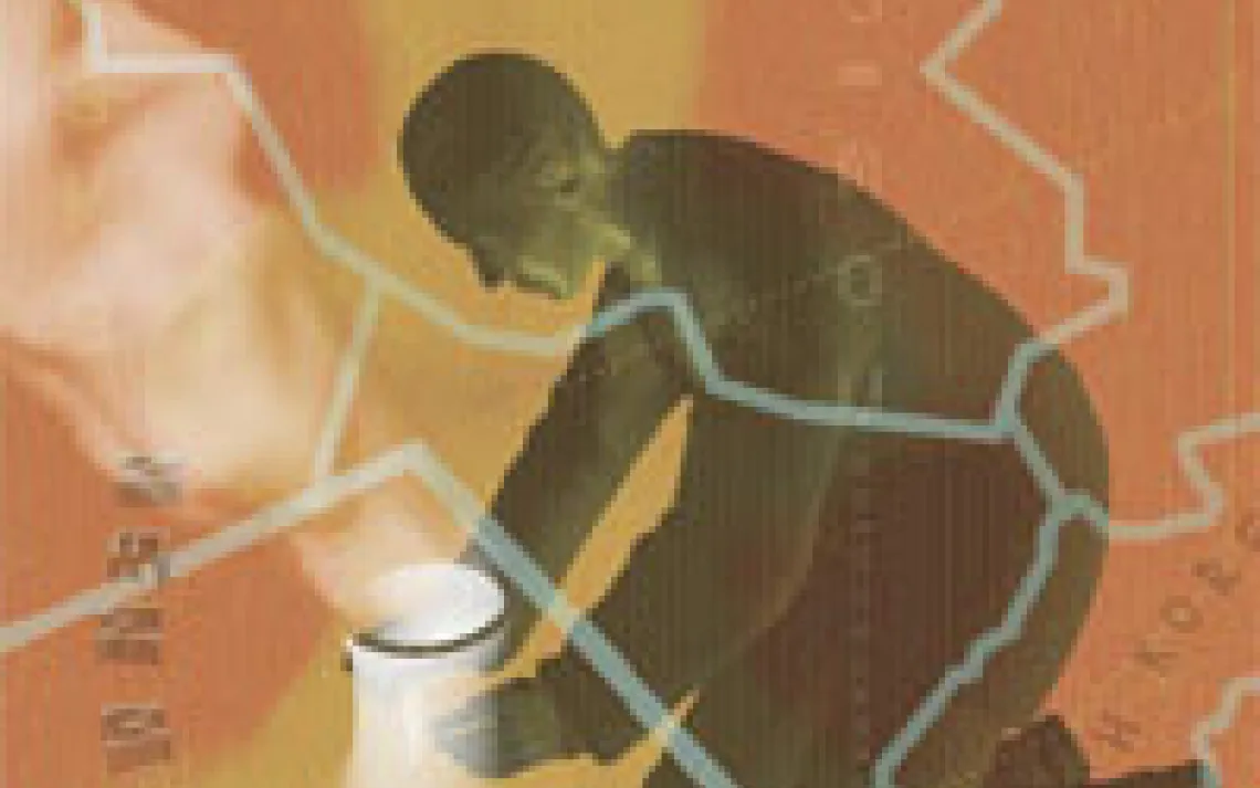 person holding nuclear plant on a map