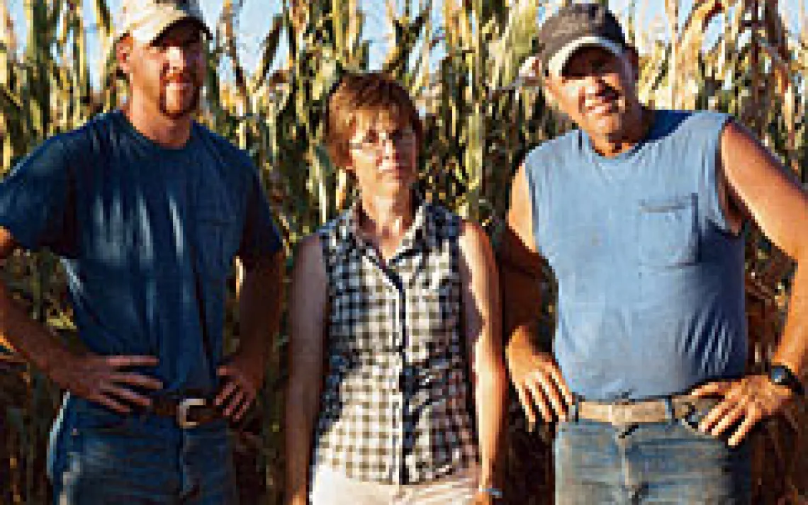 Annette and Ron Dubas, with their youngest son, Clint, on their Lazy D Ranch outside of Fullerton, Nebraska.