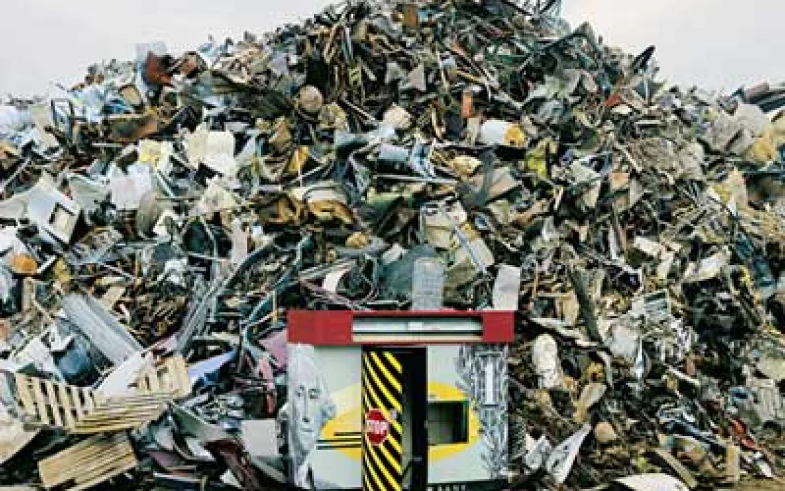Photographer Chris Jordan captured a discarded cash machine and other scrap metal slated for shredding in his E-Bank, Tacoma 2004.