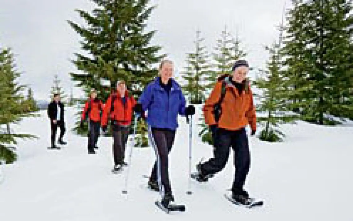 The author and her family test their newfound snow- tromping skills in the Cascade Mountains near Seattle.