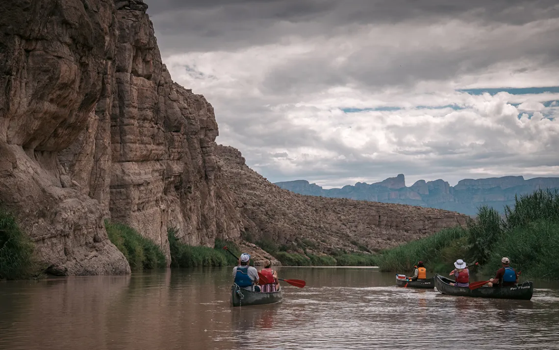 Visitors paddle on the Rio Grande through Big Bend National Park.