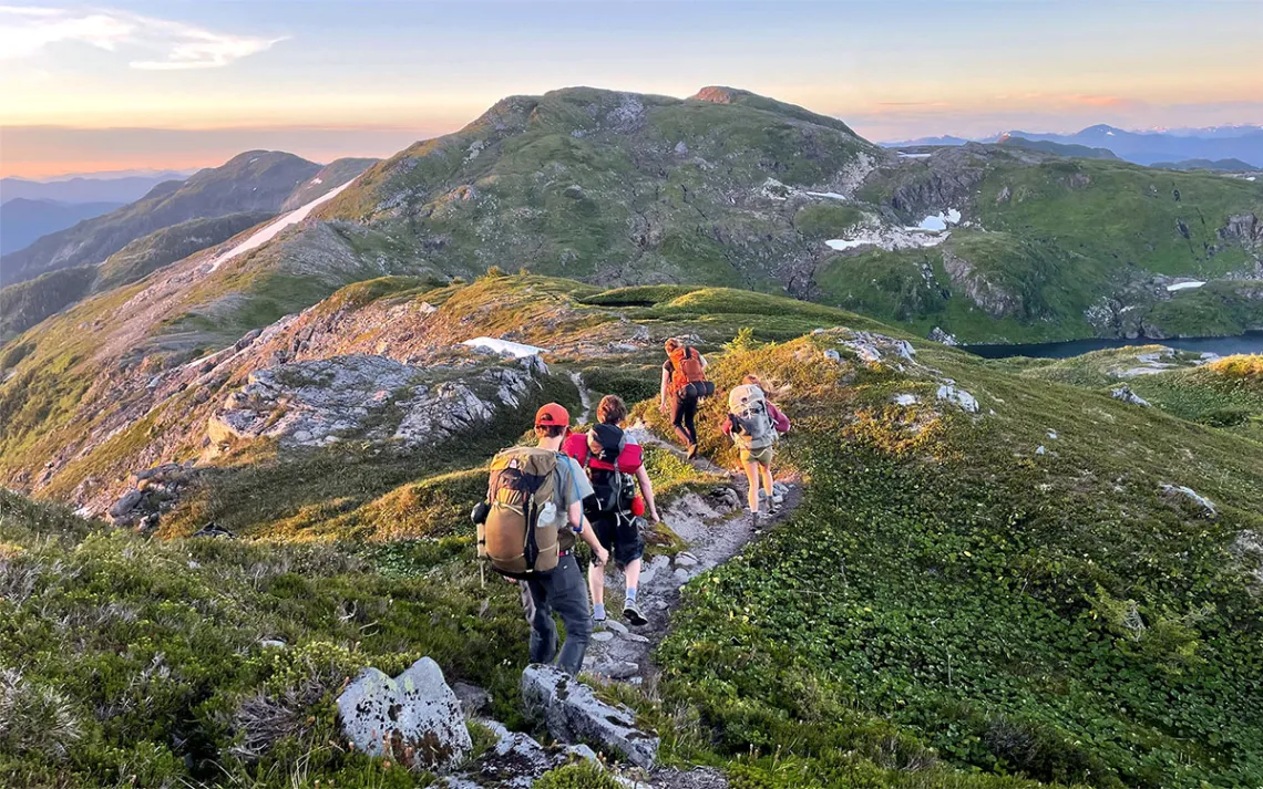 Visitors to the Tongass National Forest hike along a National Recreation Trail. (USDA Forest Service photo)