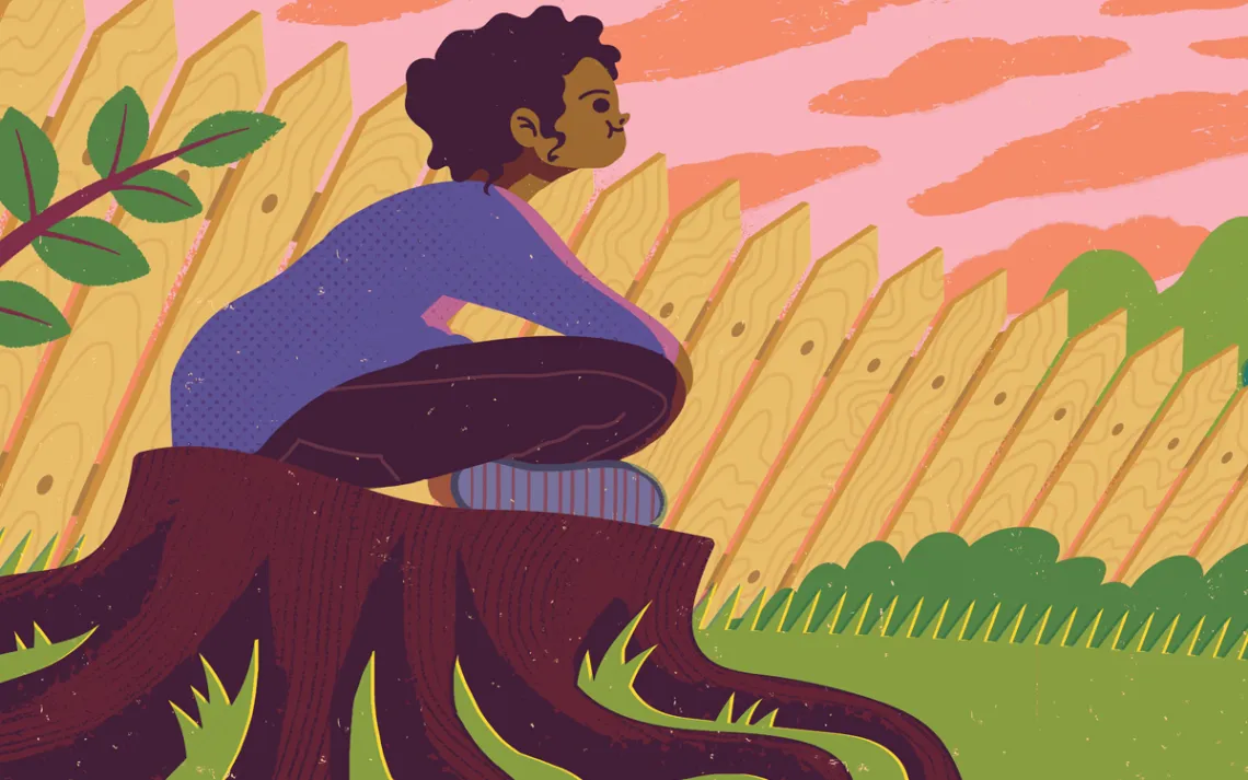 A girl sitting on a tree stump, looking toward the back of her house and an airplane.