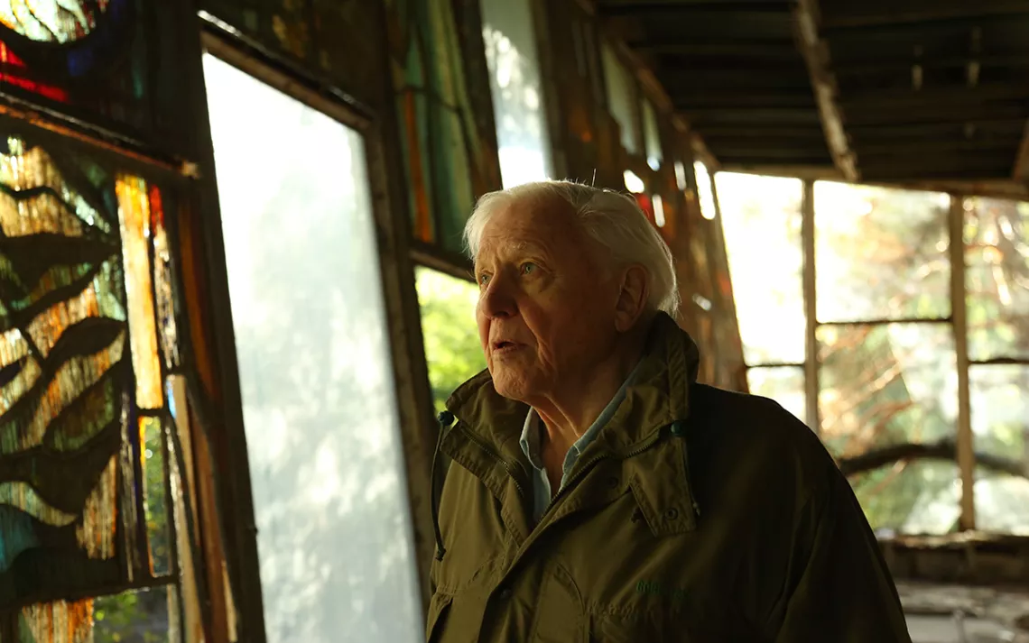 Sir David Attenborough pictured inside derelict building in Chernobyl, Ukraine.