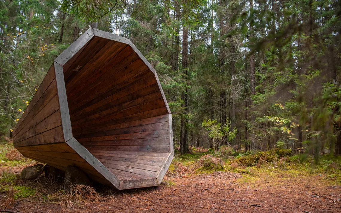  A large wooden megaphone sits in a forest in Pähni, Estonia.
