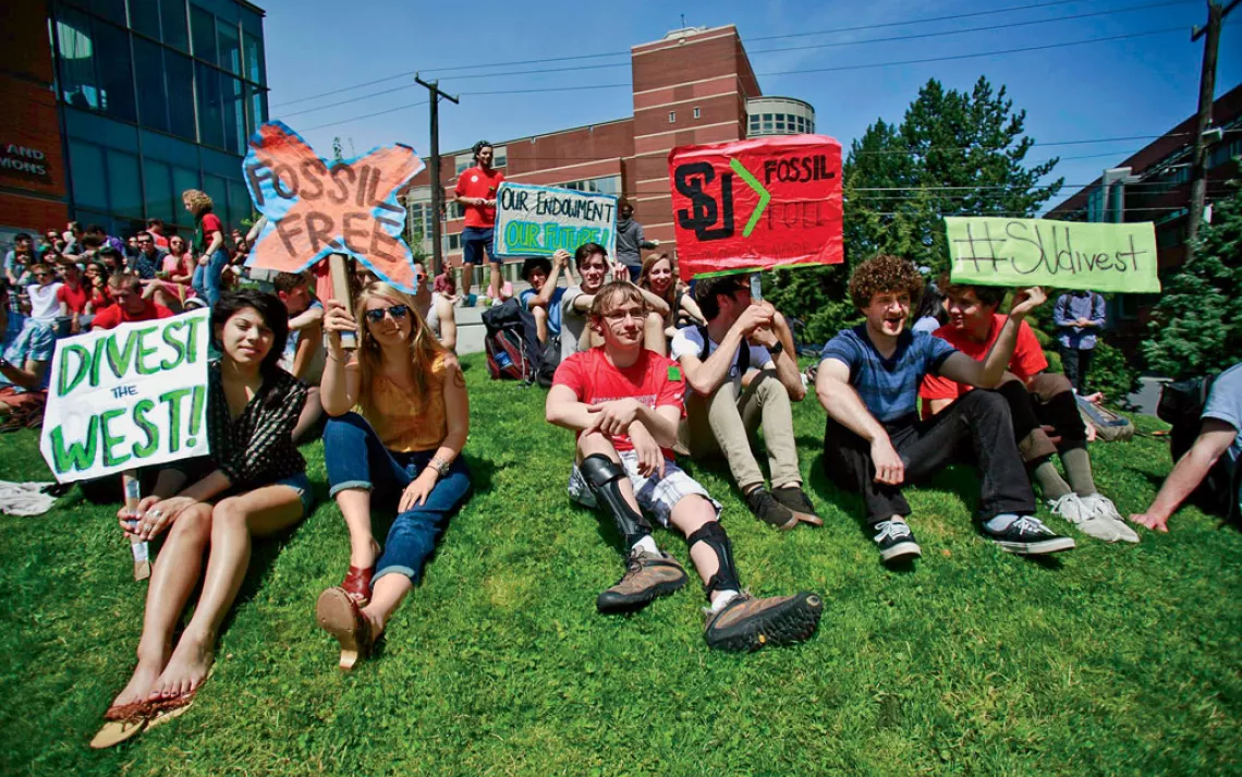 Students at Seattle University rally before delivering 600 petition signatures calling for divestment to the school's administration.