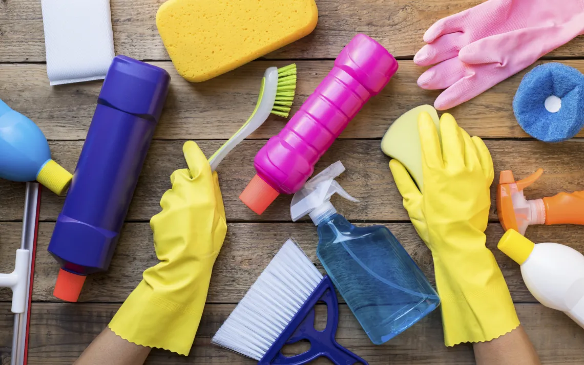 Reaching for cleaning supplies