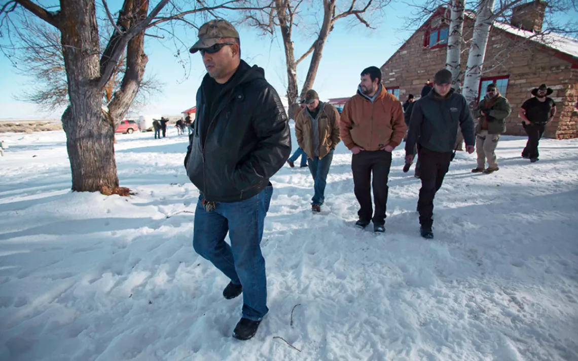 Members of the Pacific Patriots Network walk to a meeting with the occupiers of the Malheur National Wildlife Refuge in Oregon.