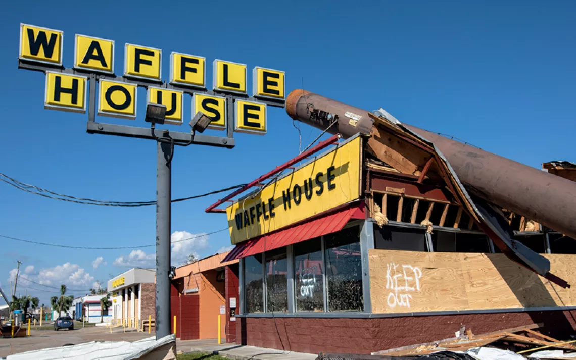 A Waffle House in Callaway, Florida, with a pole smashed through the roof after Hurricane Michael in 2018. 