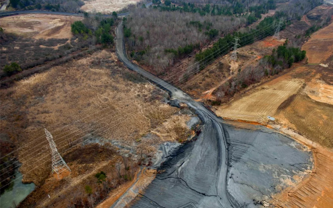 Aerial photo of black coal ash across a landscape in North Carolina.