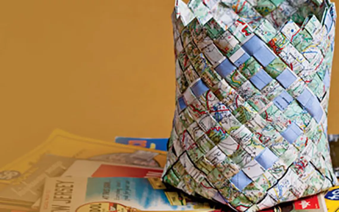 Chart a new course for your paper maps by weaving them into a sturdy, multihued basket