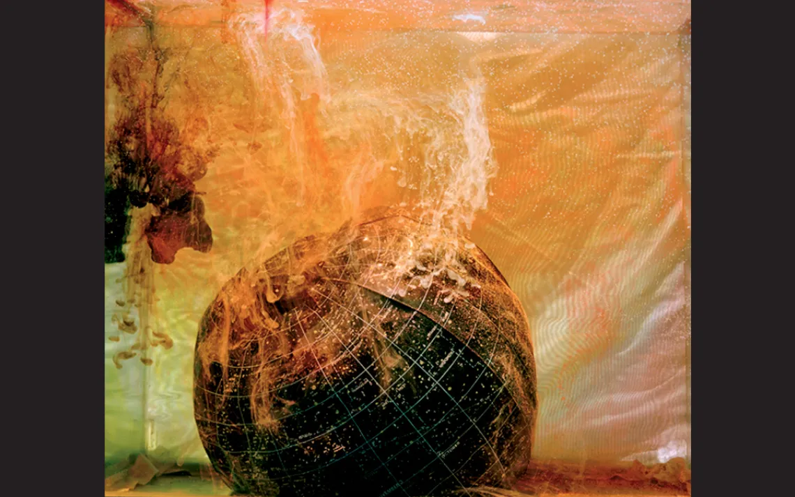 Kim Anno's works, including the large-format photograph Sunset Heaven's Ball (2010), "wrestle with adaptation in disaster," she says.