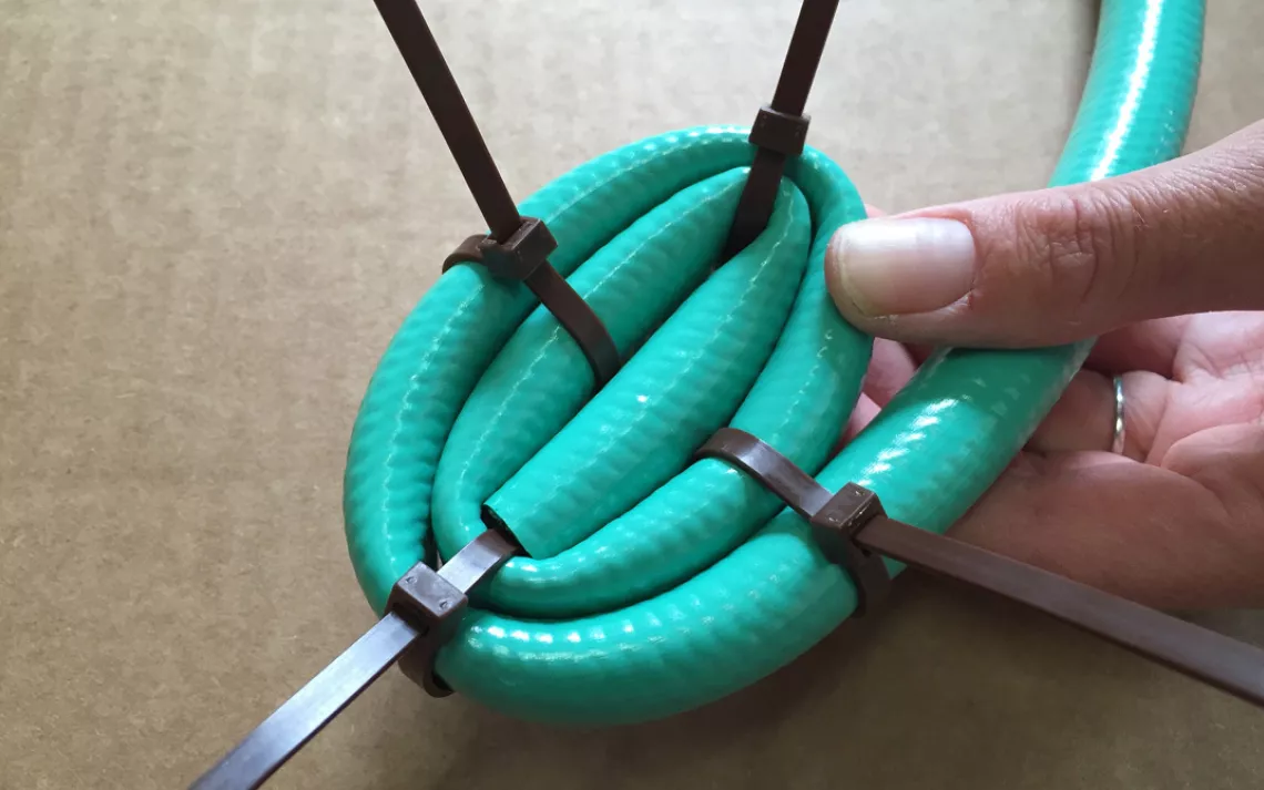 Repurpose: Garden hose to basket