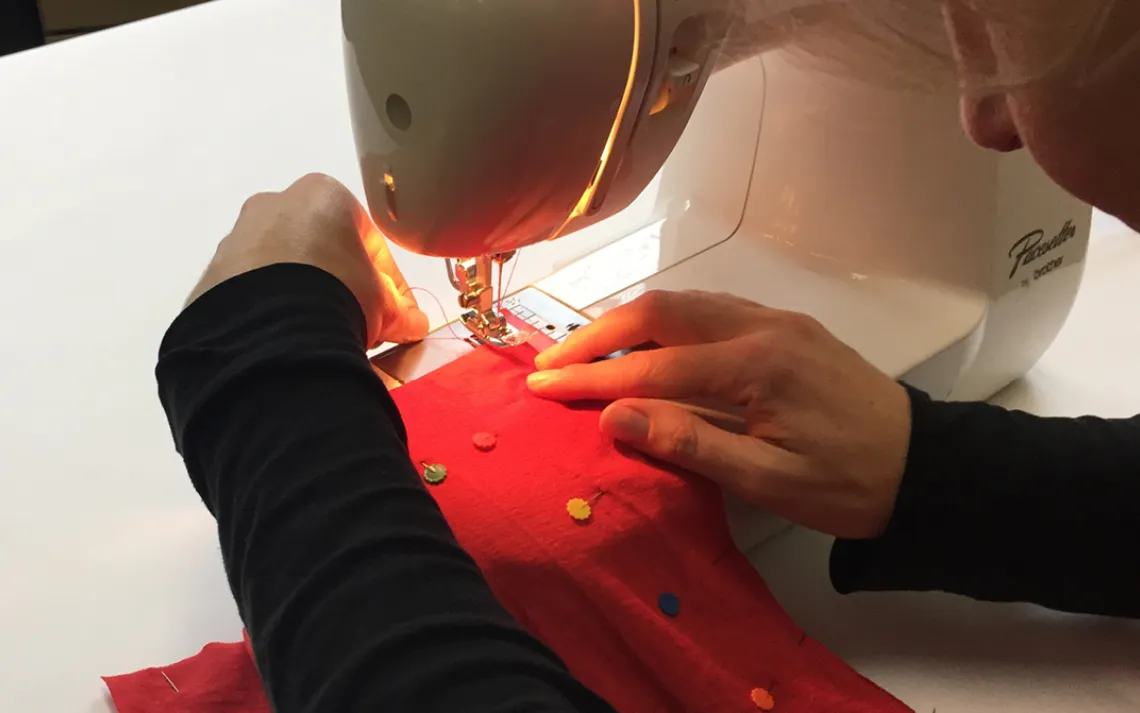 Sew along the bottom of the t-shirt (and the sides, if you trimmed the width), leaving about a half inch of fabric for the seam. 