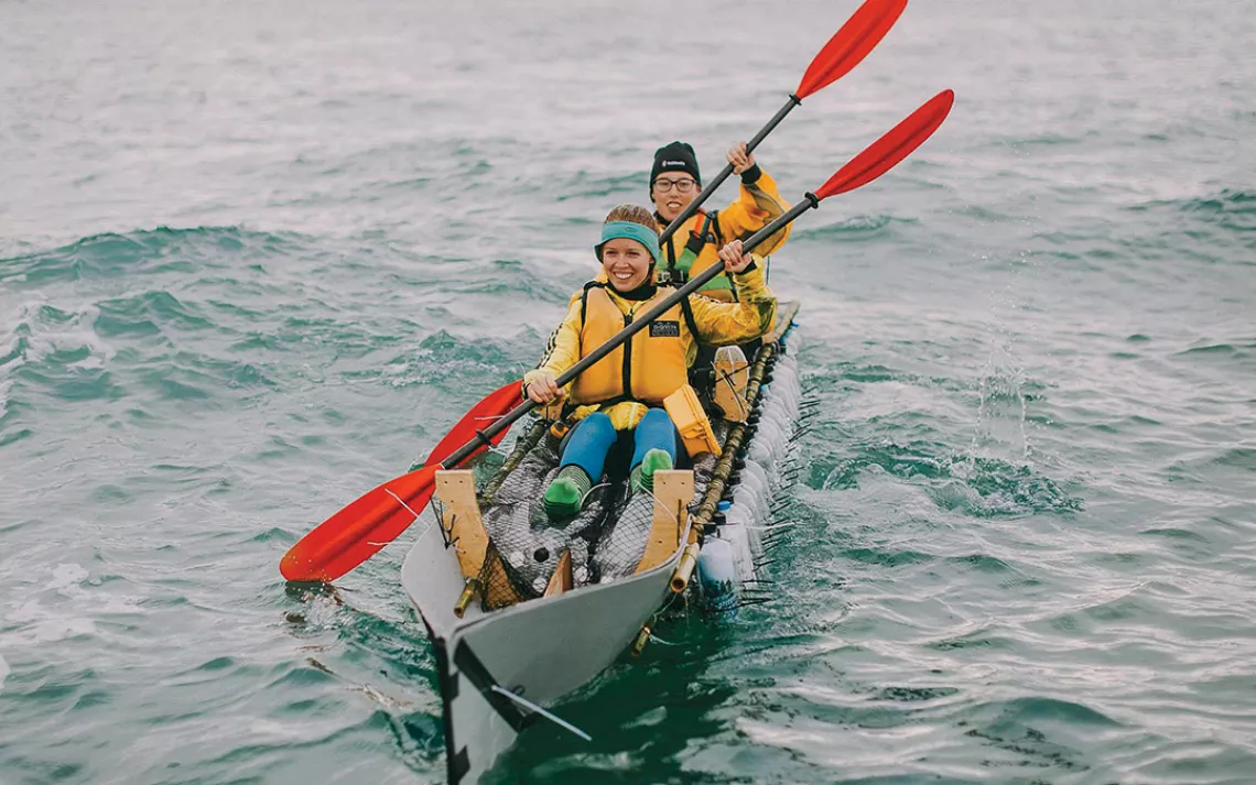 Florence Reynolds paddles a kayak made from plastic bottles in New Zealand's Abel Tasman National Park.
