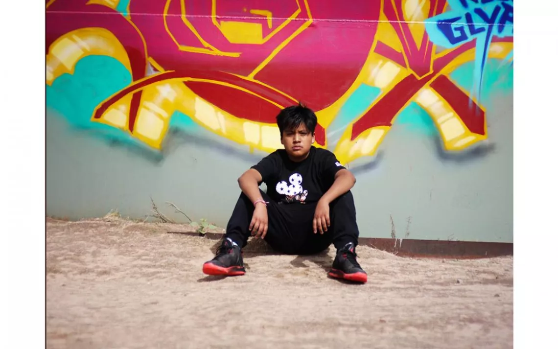 Jasmine Stevens is a Tohono O’odham photographer at Bavaquivari High School. This portrait of her brother, Keanu, reveals a glimpse of daily life for young people growing up along the border. | Photo by Jasmine Stevens 