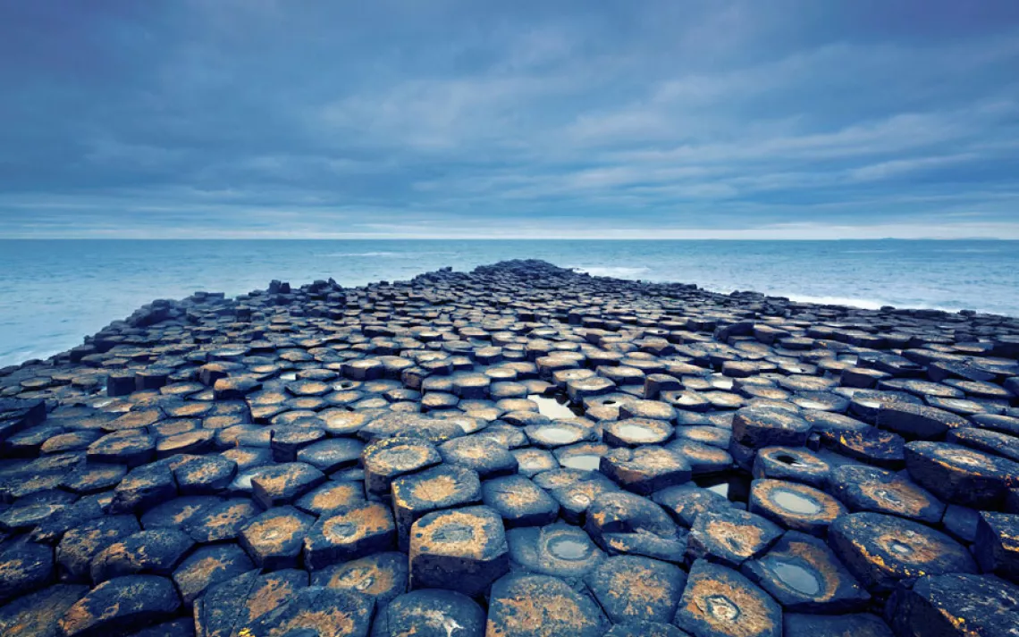 Northern Ireland's only UNESCO World Heritage Site consists of some 40,000 hexagonal basalt columns, which jut from the North Channel along the edge of the Antrim Plateau. 