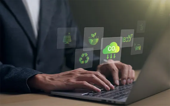 Reduce CO2 emission concept. Businessman using laptop for working technology Net zero and Carbon neutrality, green business and development based on renewable energy. 