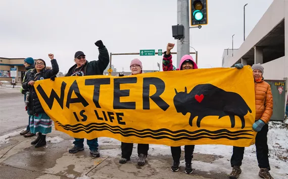 People rally in solidarity with the Standing Rock grassroots and Cheyenne River Sioux Tribe before US Army Corps hearing in Bismarck on the Dakota Access pipeline. 