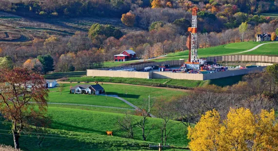 A natural gas rig side by side with homes in Washington County, Pennsylvania.