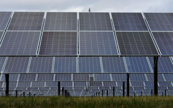 Solar panels work at the DTE O'Shea Solar Park in Detroit, MI